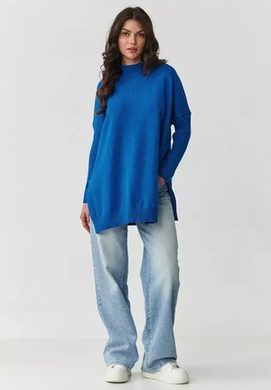 - Sweter