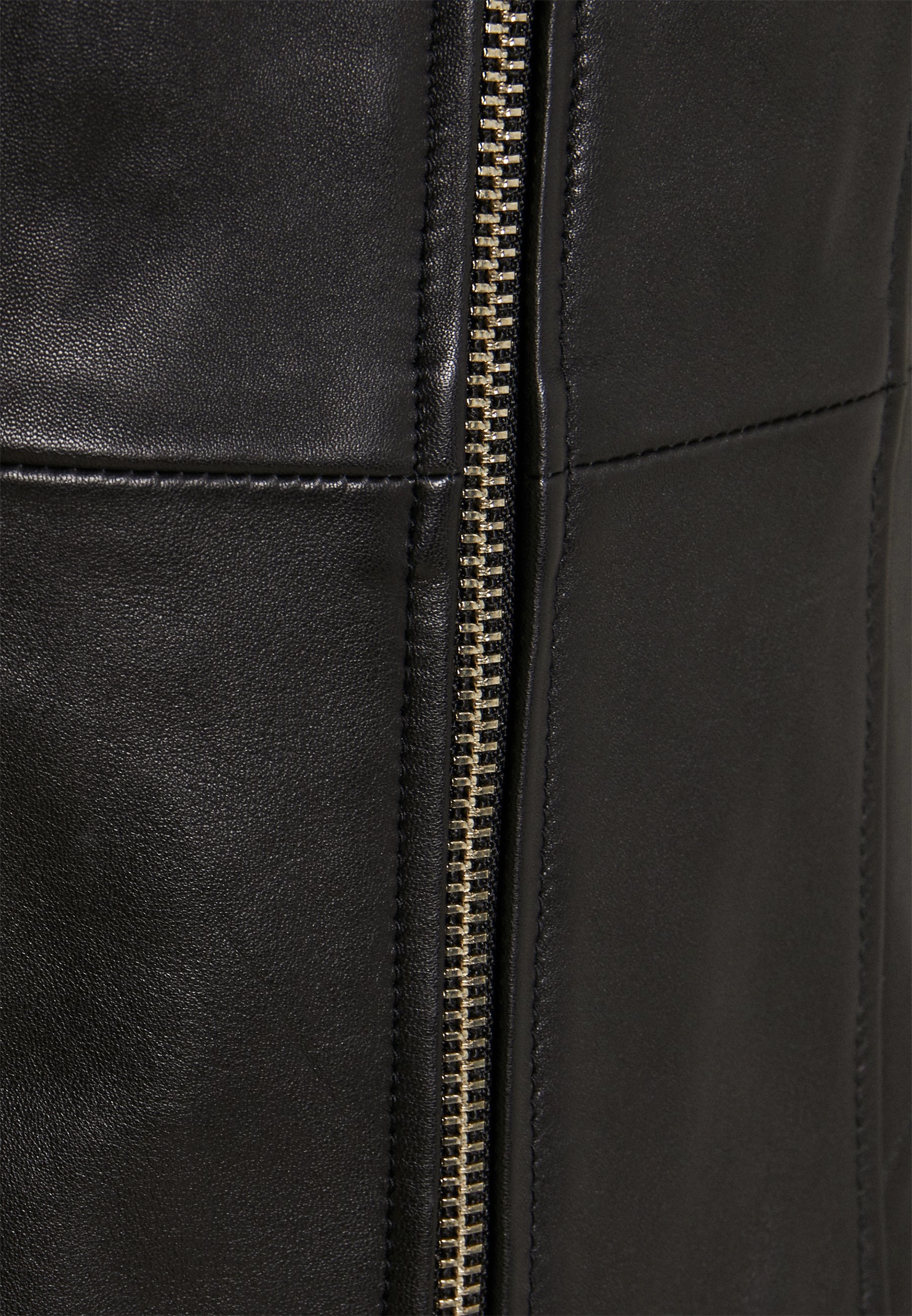 how to remove stains from faux leather jacket