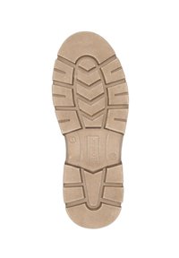 Suela de zapato de goma marrón claro con patrones texturizados, que presenta surcos en zigzag y acentos circulares. Incluye marca y tamaño.
