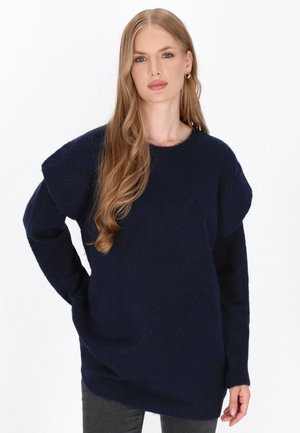 - Sweter