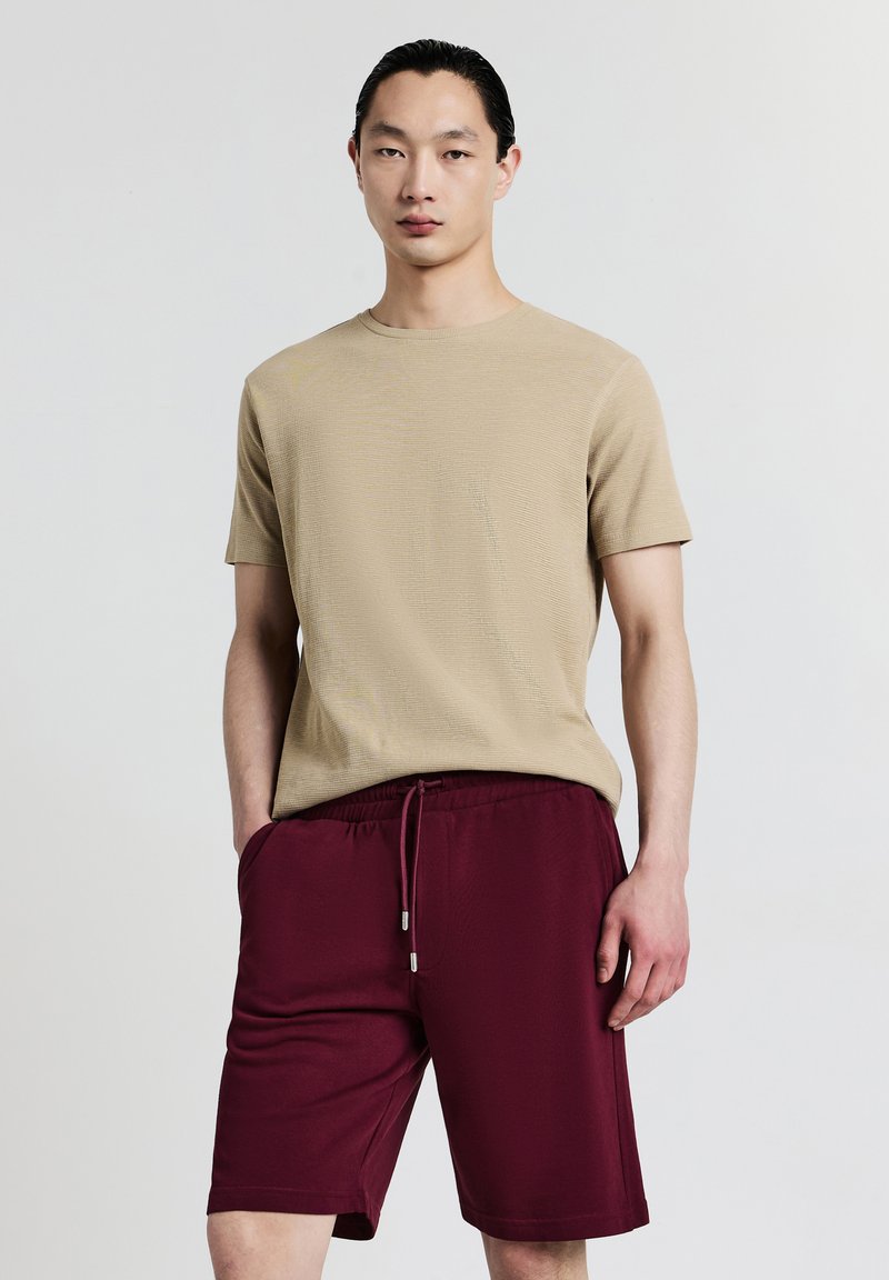 Calliope - GINNICO - Pantalon de survêtement - bordeaux, Agrandir