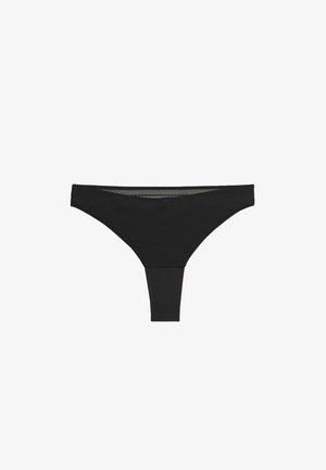 Mutandine a perizoma senza cuciture nere da donna con una fascia stretta in vita e un design posteriore a forma di "T" su sfondo bianco.