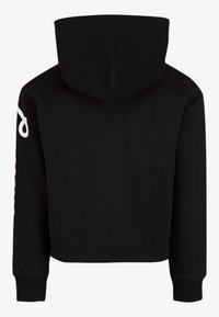 Black hooded sweatshirt with a cropped design, featuring ribbed cuffs and a large white logo detail on one sleeve. Smooth texture, cotton material.