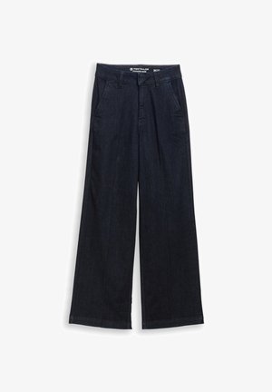 Szerokie spodnie dżinsowe w ciemnym niebieskim kolorze, z wysokim stanem, przednimi kieszeniami i gładką fakturą. Szwy starannie wykończone na obrębach.