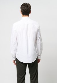 U.S. Polo Assn. CALVERT FLEX - Majica - white