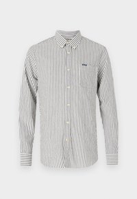 Striped button-up shirt in navy and white cotton. Features a chest pocket, round collar, and long sleeves with buttoned cuffs.