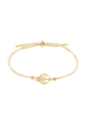 Bransoletka w złotym odcieniu z plecionym żółtym sznurkiem. Posiada okrągły medalion z motywem drzewa na środku oraz zapięcie na suwak.