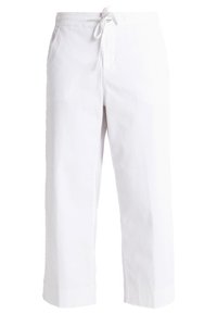 Vita vida byxor i bomull. Har en dragsko i midjan, två sidfickor och en slät, odekorerad textur.