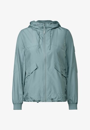 Lys petrolblå hættejakke med frontlynlås, elastiske manchetter og to store frontlommer. Glat, blankt materiale med justerbar snøre i hætten.