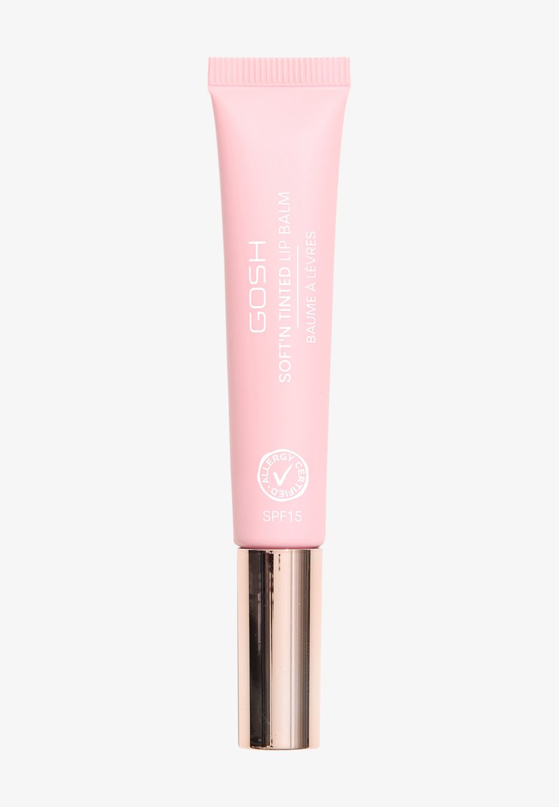 Baume à lèvres GOSH Soft'n Tinted dans un tube rose avec une base métallique dorée ; présente un texte blanc et une étiquette SPF 15, conçu pour une application facile.