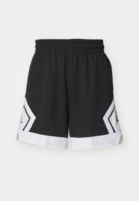 Svarta träningsshorts med elastisk midja, vita detaljer och geometriska mönster på sidorna. Tillverkade av lättviktig tyg.