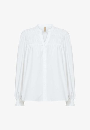 White long-sleeve blouse with smocked shoulders and cuffs, button-down front, and a round neckline with a slight V-cut.