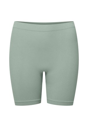 Miętowe szorty z ribbowanej tkaniny o dopasowanym kroju, z gładką talią i zagiętymi krawędziami. Bez widocznych zapięć ani wzorów.