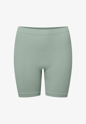 Miętowe szorty z ribbowanej tkaniny o dopasowanym kroju, z gładką talią i zagiętymi krawędziami. Bez widocznych zapięć ani wzorów.
