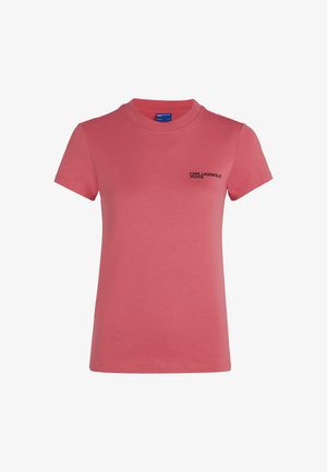 Pink cotton t-shirt with short sleeves. Features round neckline and a small black logo on the left chest area. Smooth texture.