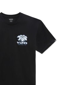 Camiseta negra de manga corta hecha de algodón. Presenta un diseño floral en blanco y azul claro con el texto "VANS" debajo. Cuello redondo estándar.