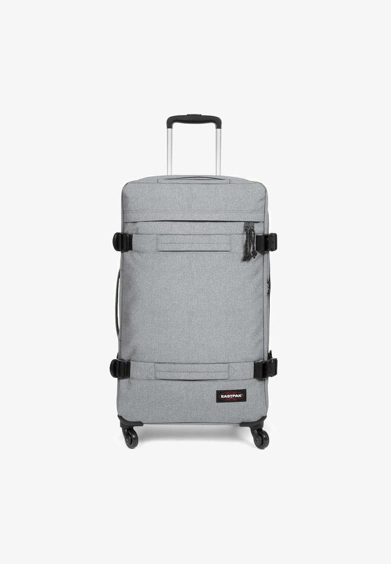 Šedý kufr na kolečkách s obdélníkovým designem, texturou látky, dvěma předními popruhy, horním madlem a teleskopickým madlem.