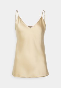 Camisola in satin dorato con scollatura a V, spalline regolabili e una texture liscia. Vestibilità aderente con orlo dritto.