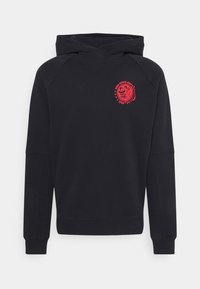 Sudadera negra con un corte relajado, que presenta un estampado gráfico rojo en el pecho. Fabricada en suave algodón con capucha ajustable y puños de canalé.