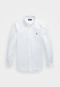 Witte, lange mouwen, katoenen blouse met knopen, voorzien van een brede kraag, knopen aan de voorkant en een klein marineblauw logo op de linkerborst.