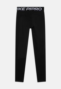 Leggings noirs ajustés, dotés d'une large ceinture marquée "NIKE PRO", d'une texture lisse et d'un design de panneaux subtils pour le confort.