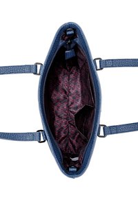 Blue textured handbag with zippers, two handles, and a patterned interior in red and black, featuring a spacious main compartment.