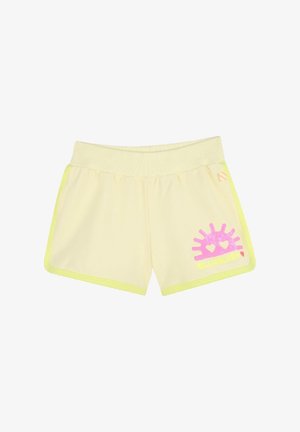 Pantaloni corti gialli con una vita elastica ribattuta, bordi verde neon e un design grafico rosa che presenta un sole con cuori.