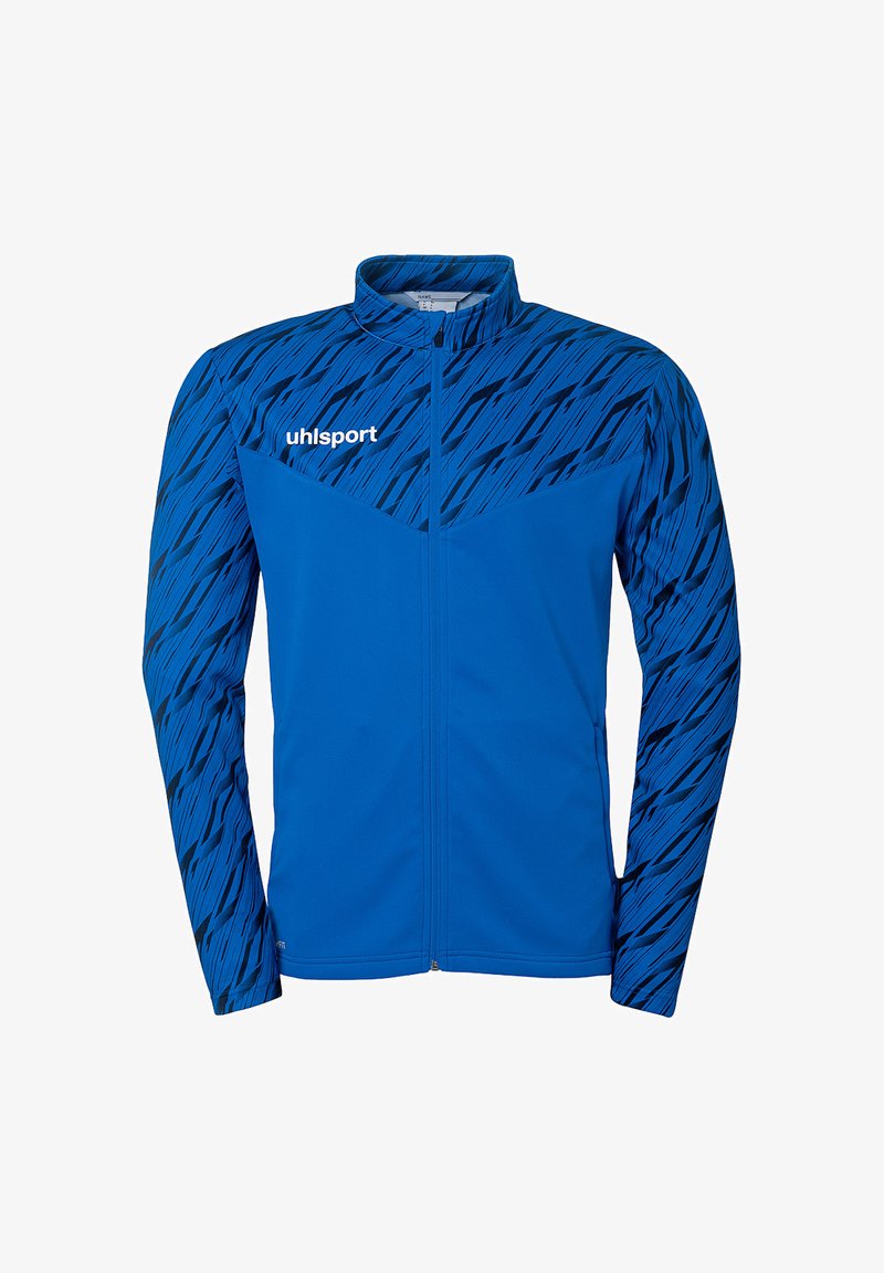 Veste de sport bleue avec fermeture éclair intégrale, présentant des rayures diagonales noires sur les épaules et les manches. Fabriquée dans un tissu lisse et léger.