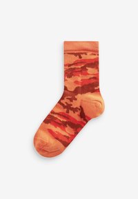 Orange sokker med et camouflagemønster i nuancer af rød og brun, med ribbet manchet og glat tekstur.