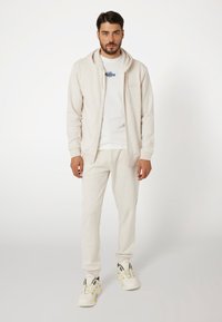 Guess MID WAIST JOGGING - Pantaloni sportivi - beige