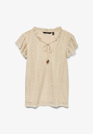 Blouse en dentelle beige avec un col en V, des manches courtes volantées et un détail à cordon rehaussé de perles en bois.