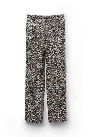 Pantaloni a gamba larga con motivo leopardato in nero, beige e bianco e vita elastica.