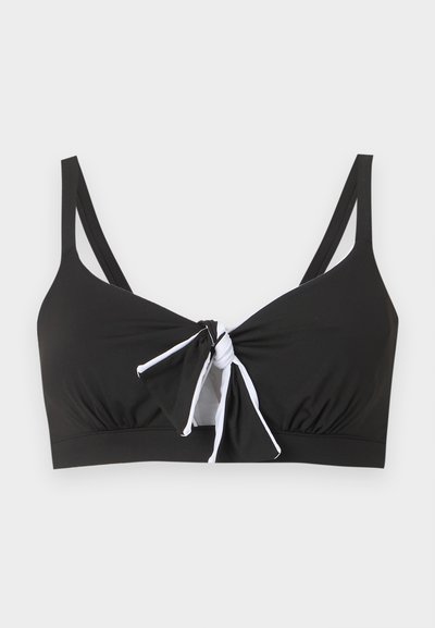 Μαύρο πάνω μέρος μπικίνι με λεπτούς ιμάντες ώμου και λεπτομέρεια κόμπου μπροστά, περιγραμμένη με λευκό σε μονόχρωμο φόντο.