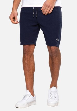 OTTOMAN - Tracksuit bottoms - navy