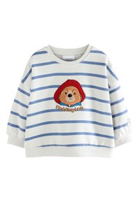 Sweatshirt blanc à rayures horizontales bleues. Présente un motif brodé de l'ours Paddington avec un chapeau rouge, un col bleu et des poignets côtelés.