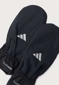 Fekete kesztyűk texturált felülettel, fényvisszaverő csíkokkal és párnázott csuklórésszel, amelyen a „CLIMAWARM” felirat olvasható. Sima, könnyű kialakítás.