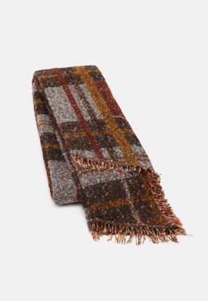 Folded woven scarf with autumnal plaid pattern in rust, mustard, gray, and black, featuring fringed edges.