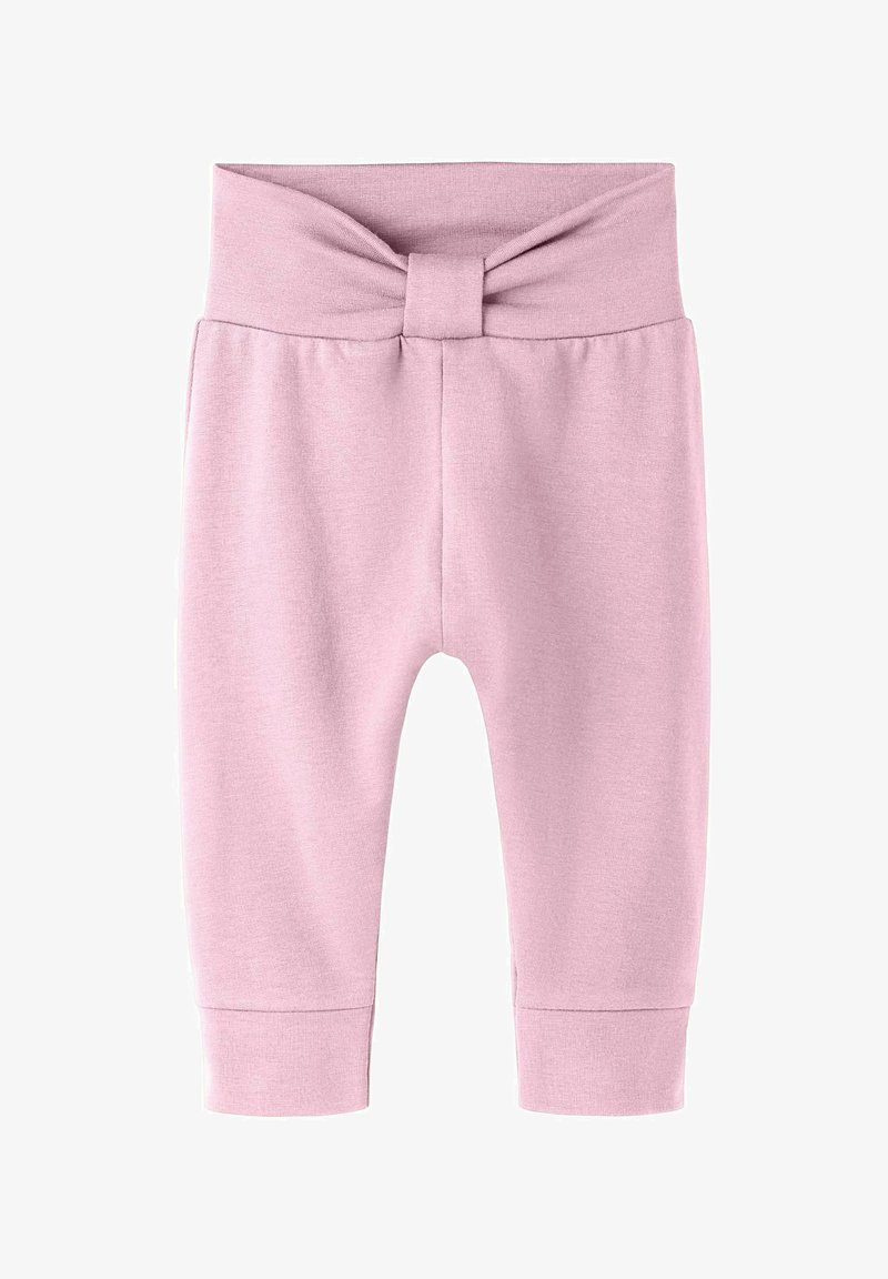 Mäkké ružové detské nohavice s vysokým pásom, ktorý obsahuje stredový detail v podobe uzlíka z látky a rebrované manžety na členkoch.