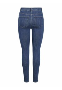 Jean skinny en denim bleu foncé vu de dos avec deux poches arrière et des coutures visibles le long des coutures.