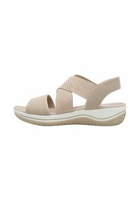 Sandalo beige con design a tracolla incrociata, realizzato in materiale a rete traspirante. Presenta una suola imbottita e dettagli testurizzati.