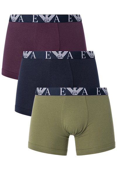 Three pairs of boxer shorts in dark burgundy, navy, and olive green. Each features a navy elastic waistband with a white logo design.