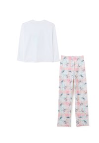 Witte lange mouwen top gecombineerd met roze pyjamabroek met een patroon van cartoonfiguren en lichtblauwe accenten. Zacht katoenmateriaal.