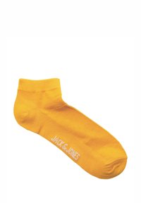 Gele katoenen enkelsok met een wit "JACK & JONES" logo aan de zijkant, een gladde textuur en een aangesloten ontwerp voor comfort.