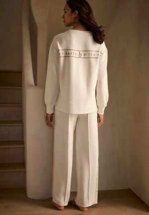 WIDE LEG JOGGERS - Spodnji deli trenirk - cream