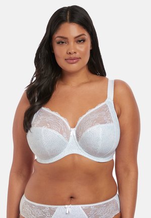 Light blue lace bra with semi-transparent cups, textured patterns, adjustable straps, and a central bow accent. Soft material.