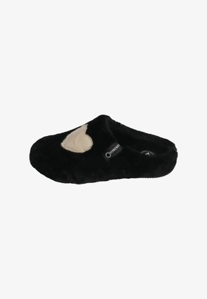 Black fuzzy slipper with a cream heart-shaped accent, featuring a soft texture, open back design, and a rubber sole.