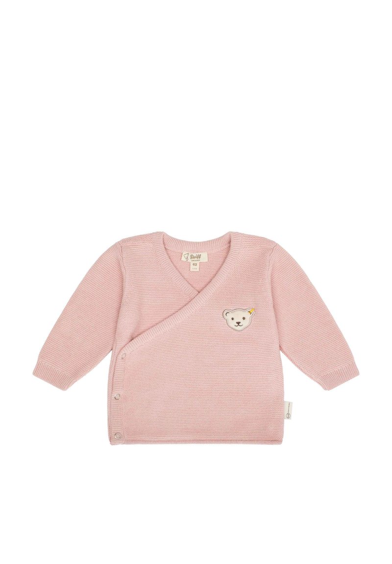 Růžový pletený cardigan s výstřihem do V a dlouhými rukávy, se zvláštním motivem medvídka a zapínáním na knoflík na boku. Hladká textura.