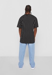 Karl Kani T-shirt imprimé - black