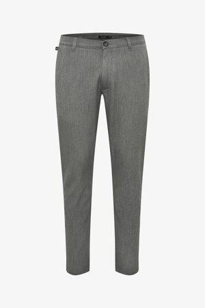 Gray tapered trousers made of woven fabric with a smooth texture, featuring a front button closure and side pockets.