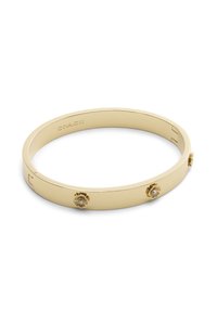 Bracciale a bangle in tono oro con dettagli floreali, superficie liscia e chiusura a cerniera. Presenta dettagli intricati nei disegni dei fiori.